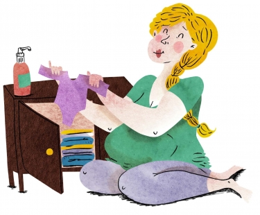 Illustratie Zwangere vrouw met kinderkleertjes